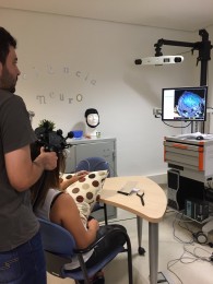 The TMS-FFR experiment setup at BBSL and Fran López-Caballero running one of his participants